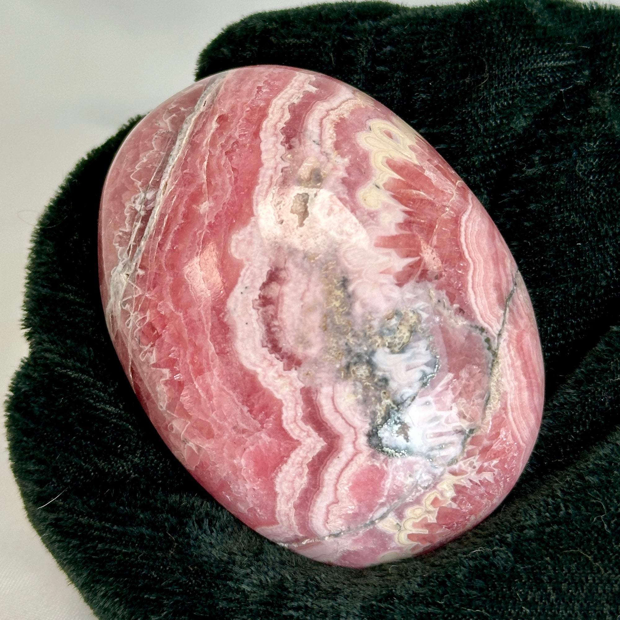Rhodocrosite Palm Stone