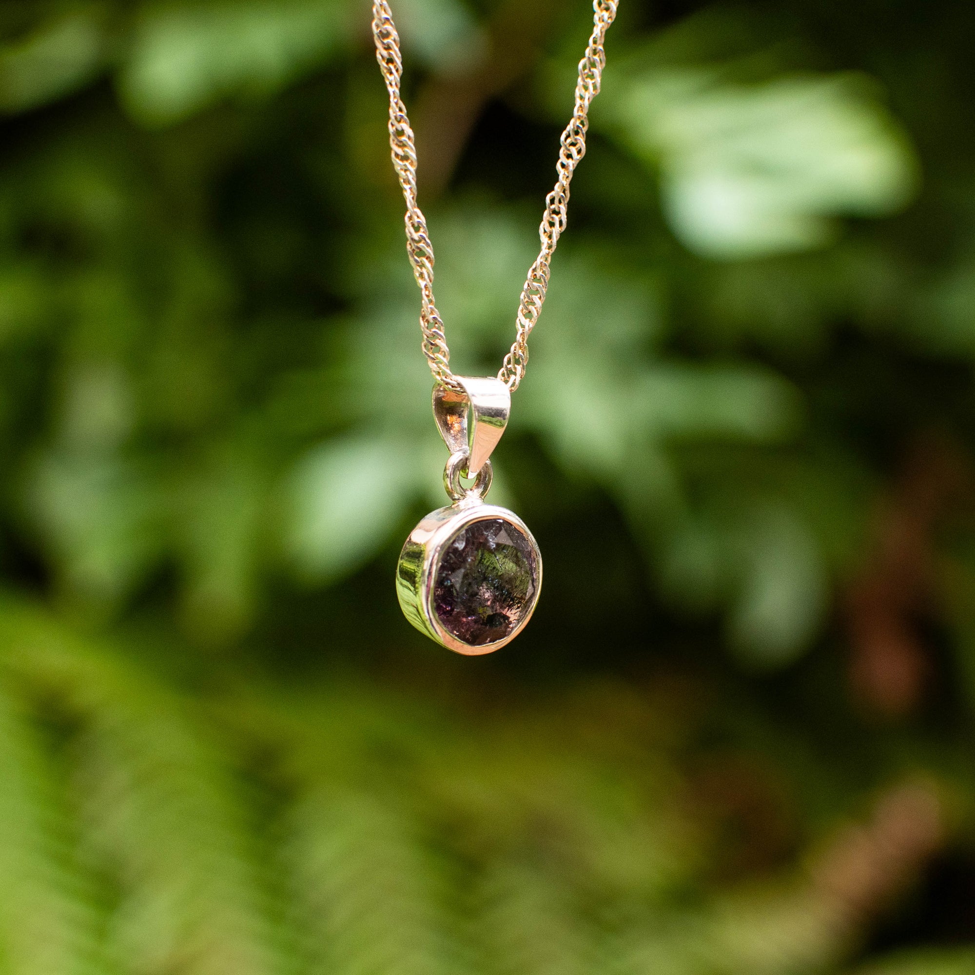 Faceted Super 7 Circle Pendant