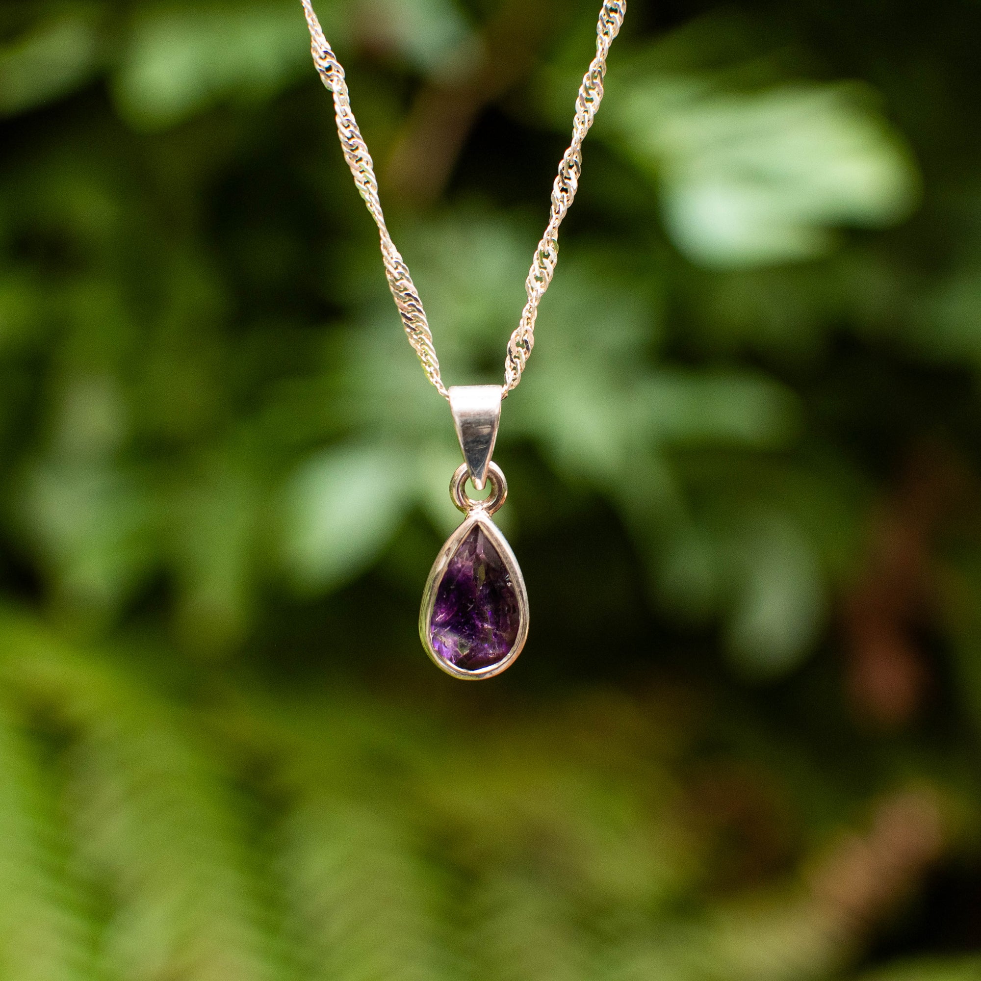 Faceted Super 7 Teardrop Pendant