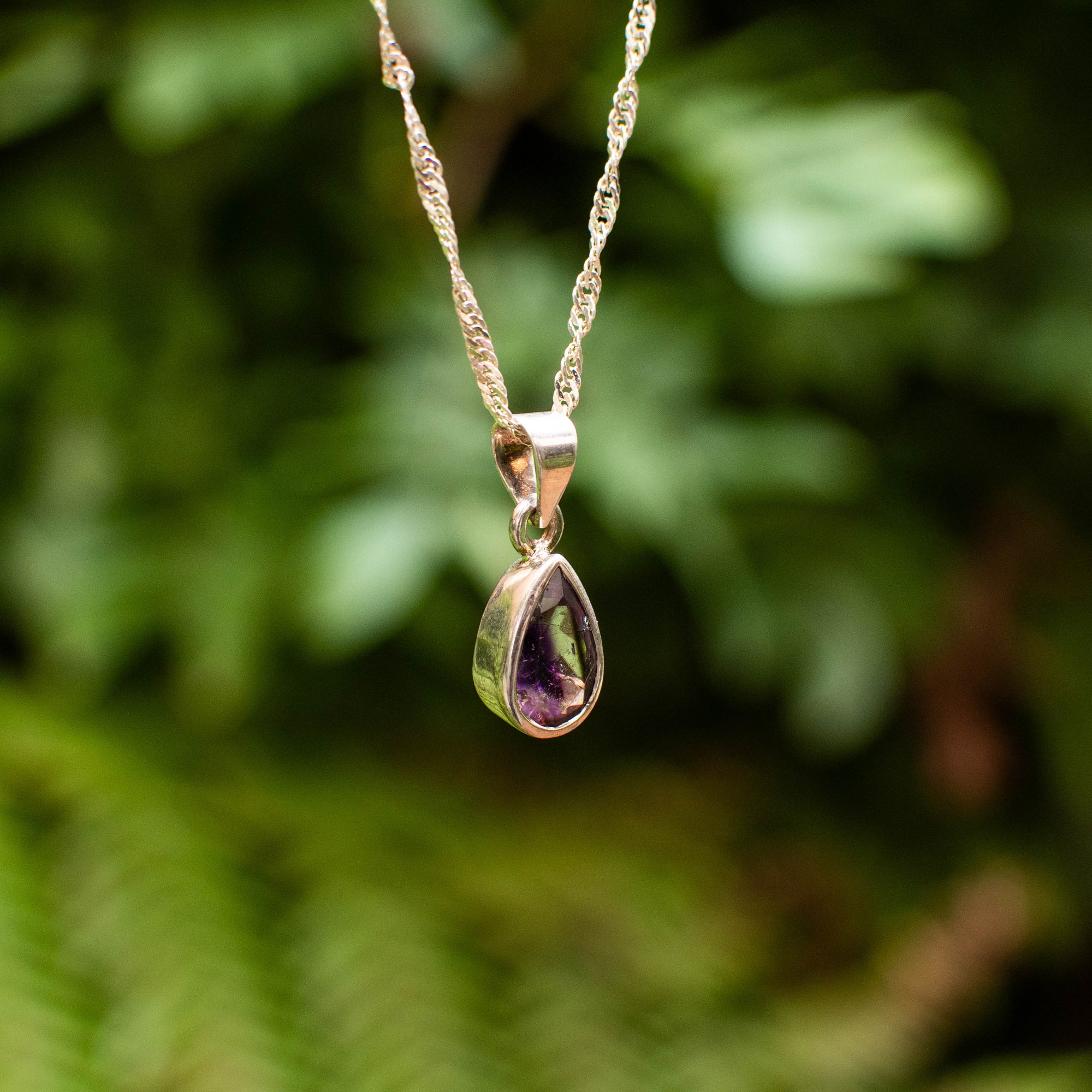 Faceted Super 7 Teardrop Pendant