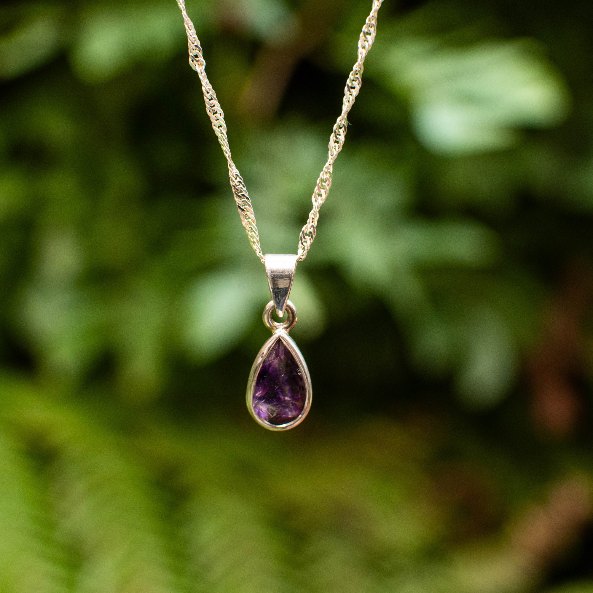 Faceted Super 7 Teardrop Pendant