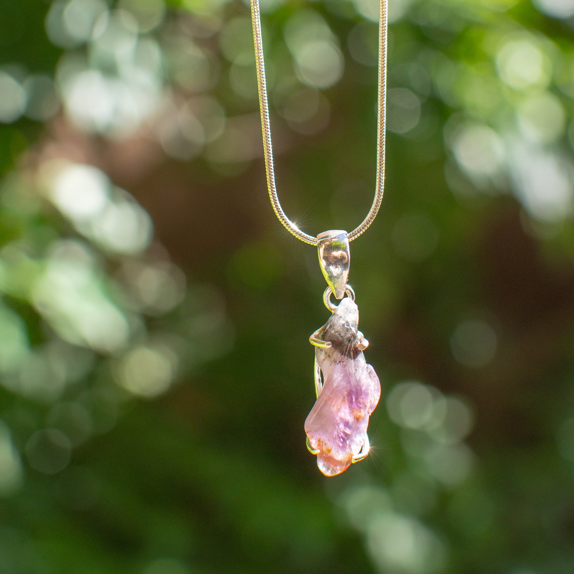 Super 7 or Cacoxenite Pendant