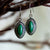 Sterling Silver Malachite Earrings with southwestern styled silver