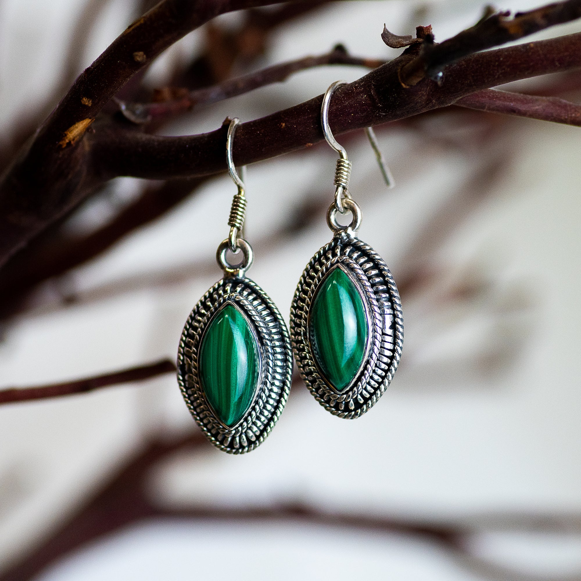 Sterling Silver Malachite Earrings with southwestern styled silver