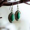 Sterling Silver Malachite Earrings with southwestern styled silver