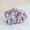 Natural mineral raw pink tourmaline stone in quartz matrix from The Healing Portal Ventura